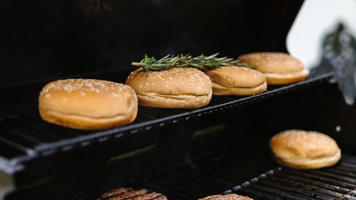 Pellet grill vs charcoal grill side by side
